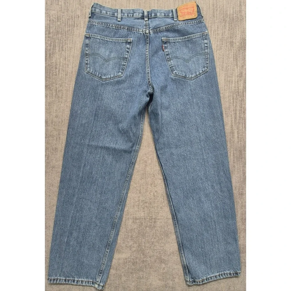 Levi 550 men's medium wash denim blue‎ jeans 38x32 Cotton straight leg